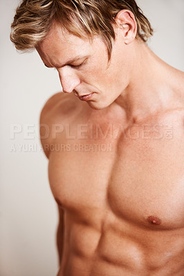 He's perfectly sculpted  Buy Stock Photo on PeopleImages, Picture
