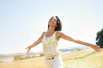 Buy stock photo Happy, freedom and woman with arms raised at field outdoor in the countryside in spring. Person in nature, eyes closed and relax at farm, breathe fresh air or enjoy vacation, travel and peace or calm