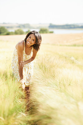 Buy stock photo Portrait, wheat or happy woman in field, countryside or nature in summer to relax on break. Smile, wellness or female person in grass for peace or fresh air on an outdoor holiday vacation or travel
