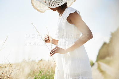 Buy stock photo Sunshine, wheat field and woman with nature, grass and environment with break, weekend and landscape. Person, girl and traveller with freedom, exploring and plants with ecology, spring and summer
