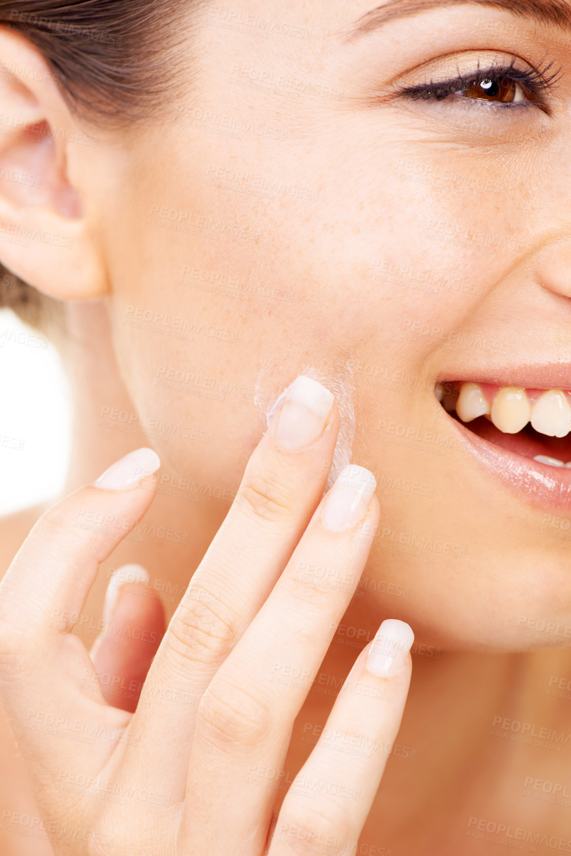 Buy stock photo Happy woman, face and hands with cream for skincare, beauty or cosmetics against a studio background. Closeup of female person or model smile in satisfaction for lotion, creme or facial product