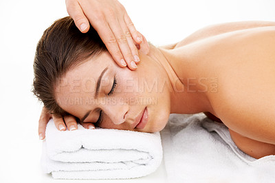 Buy stock photo Hand, face and spa massage with a woman in studio isolated on white background to relax. Head, wellness or luxury treatment and a young customer at the salon for physical therapy with a masseuse