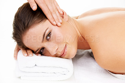 Buy stock photo Portrait, massage and beauty with a woman at the spa in studio isolated on a white background to relax. Hands, face and head with a happy young salon customer on a table for luxury wellness treatment