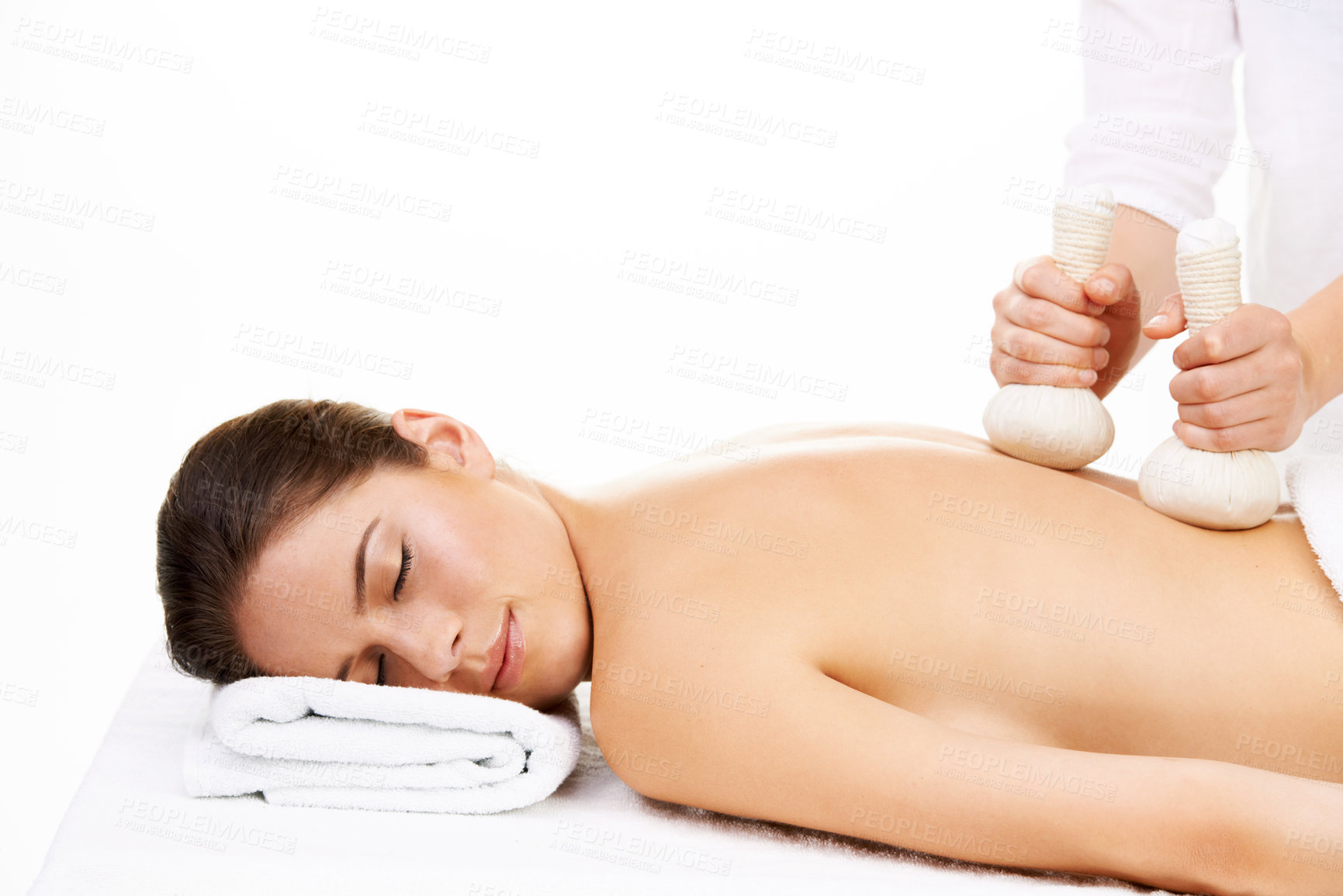 Buy stock photo Spa, heat compress and woman for massage, back treatment and salon care on towel. Skincare, dermatology and masseuse with person for relax, calm and wellness for luxury cosmetics on white background