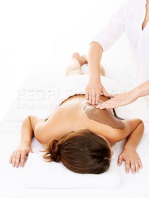 Buy stock photo Woman, mud massage and therapist for body, back and physical therapy for treatment and relax. Skin care, masseuse and wellness with application, dermatology and hands, luxury and white background
