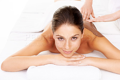 Buy stock photo Happy woman, portrait and relax for mud massage, spa or zen on bed at luxury resort or salon. Attractive or calm female person or model smile for body therapy, beauty treatment or stress relief