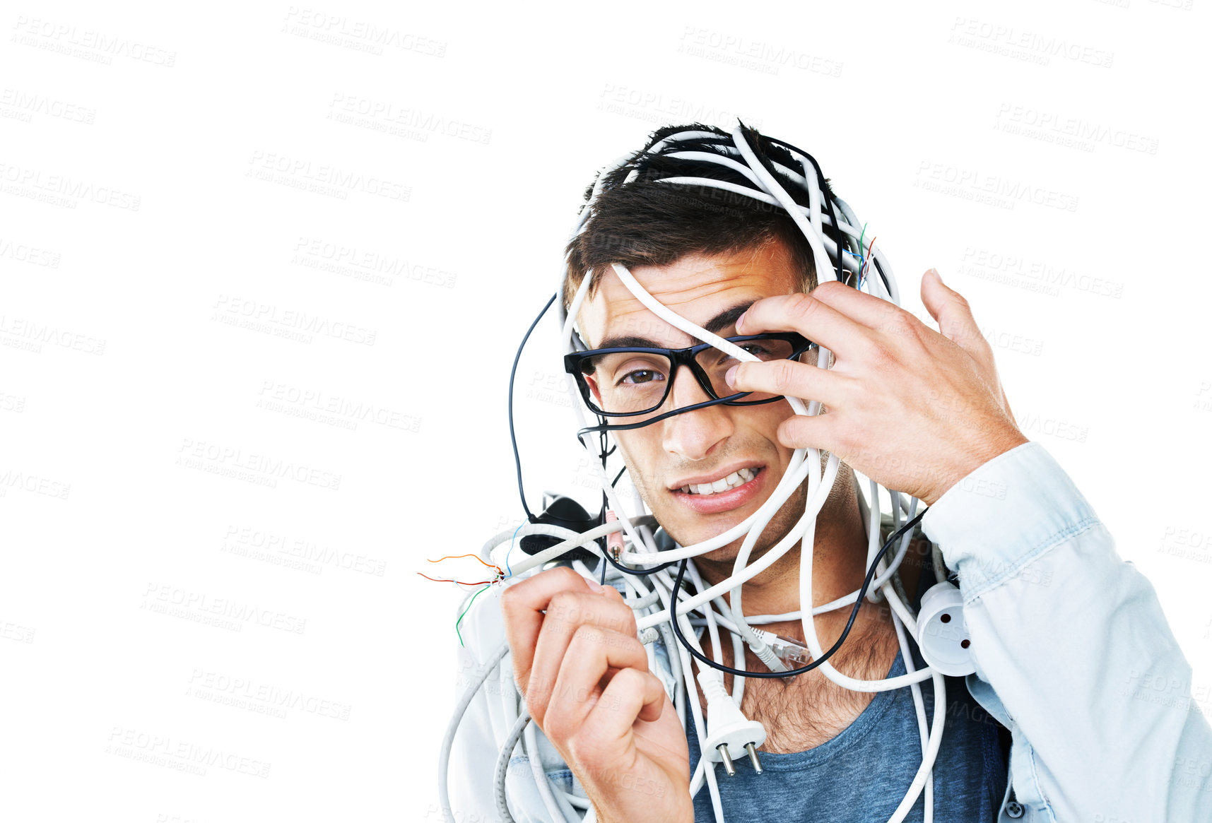 Buy stock photo Portrait of man in glasses tangled in cables, wire and isolated on white background. Face of serious geek with cord, wiring and technology of nerd or electrician, mistake and problem on mockup space