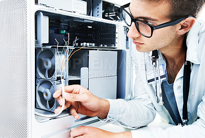 Buy stock photo Computer tower, wires and man fixing studio hardware, electronics or check machine electrical power damage. Maintenance, technician analysis and IT specialist problem solving on white background
