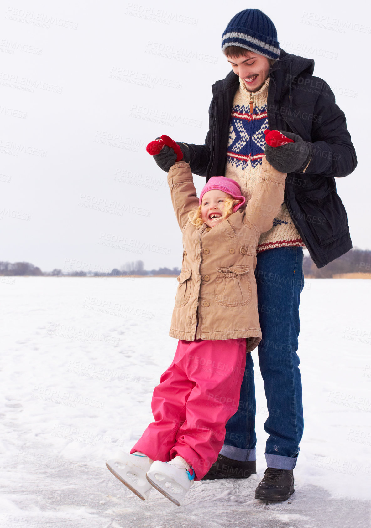 Buy stock photo Man with girl outdoor, learn to ice skate and fun in nature with snow, sports and recreation. Father spending quality time with daughter, teaching and learning skating on frozen lake during winter