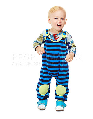 Buy stock photo Baby, boy and toddler in studio with fashion, style and grow with curiosity, happiness and excited for kindergarten. Child, smile and standing in white background in jumpsuit, outfit and clothes