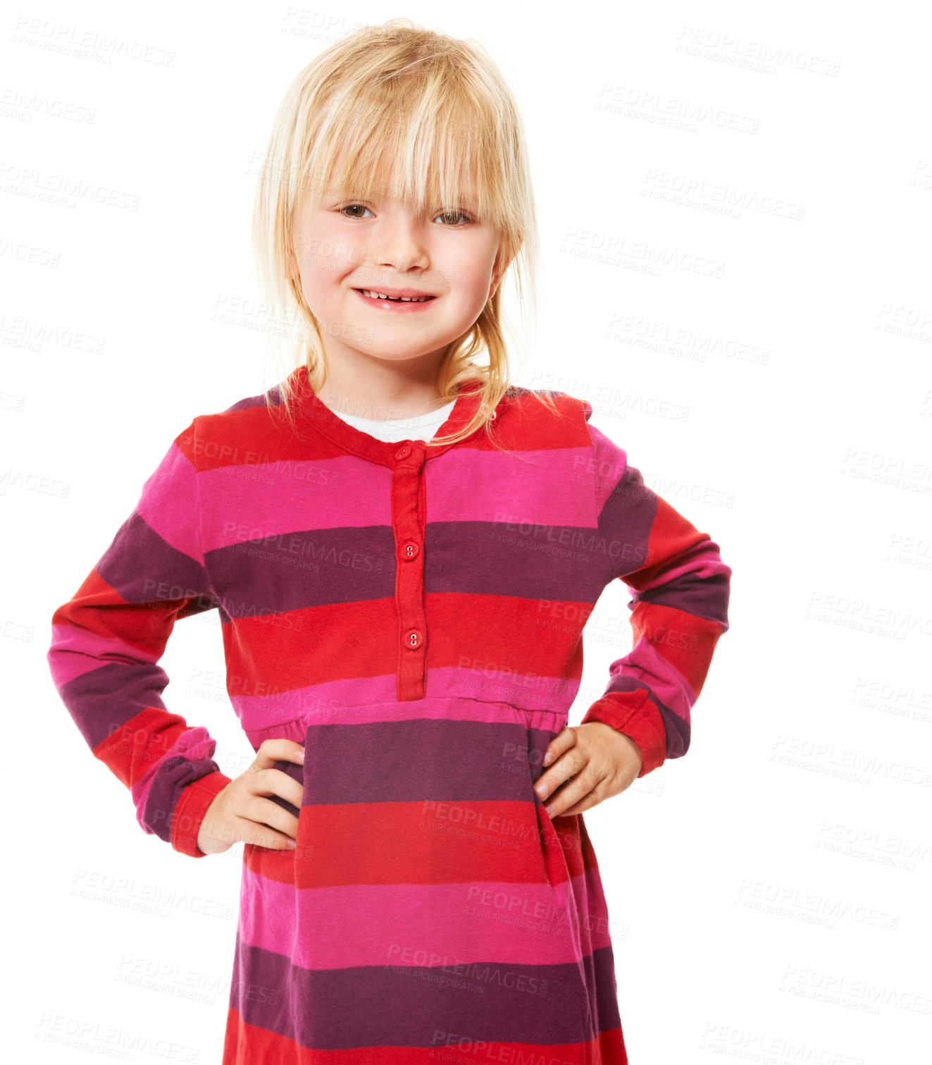 Buy stock photo A cute little blonde girl smiling while standing with her hands on her hips