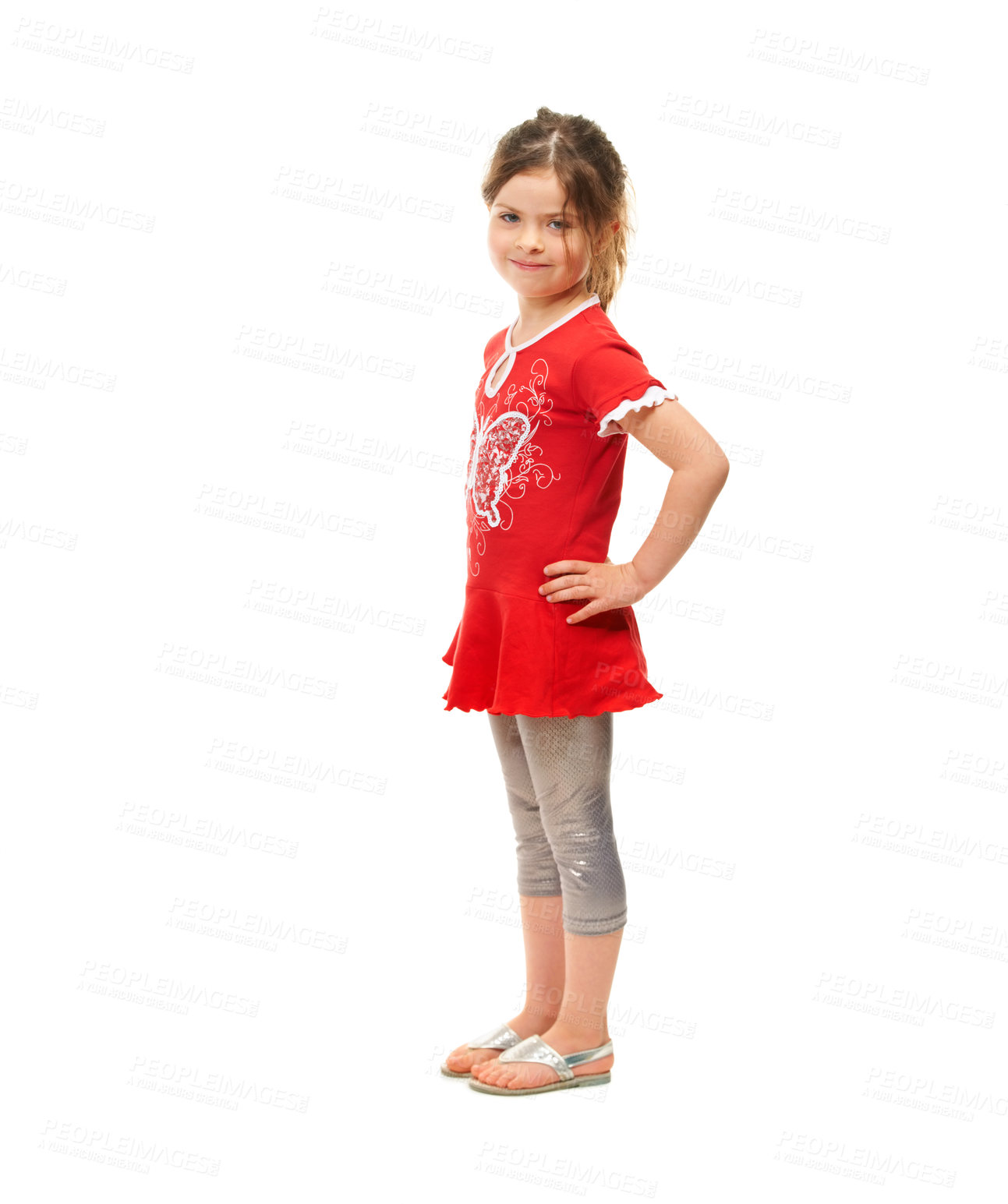 Buy stock photo Cute little girl standing against a white background