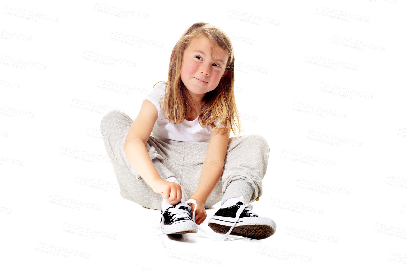 Buy stock photo Shot of a cute little girl isolated on white