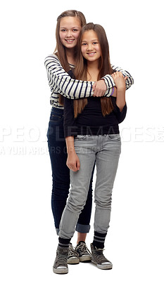 Buy stock photo Studio shot of a two teenage girls posing together against a white background