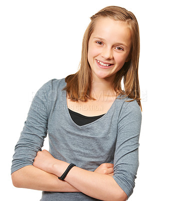 Buy stock photo Studio portrait of a young teenage girl standing against a white background