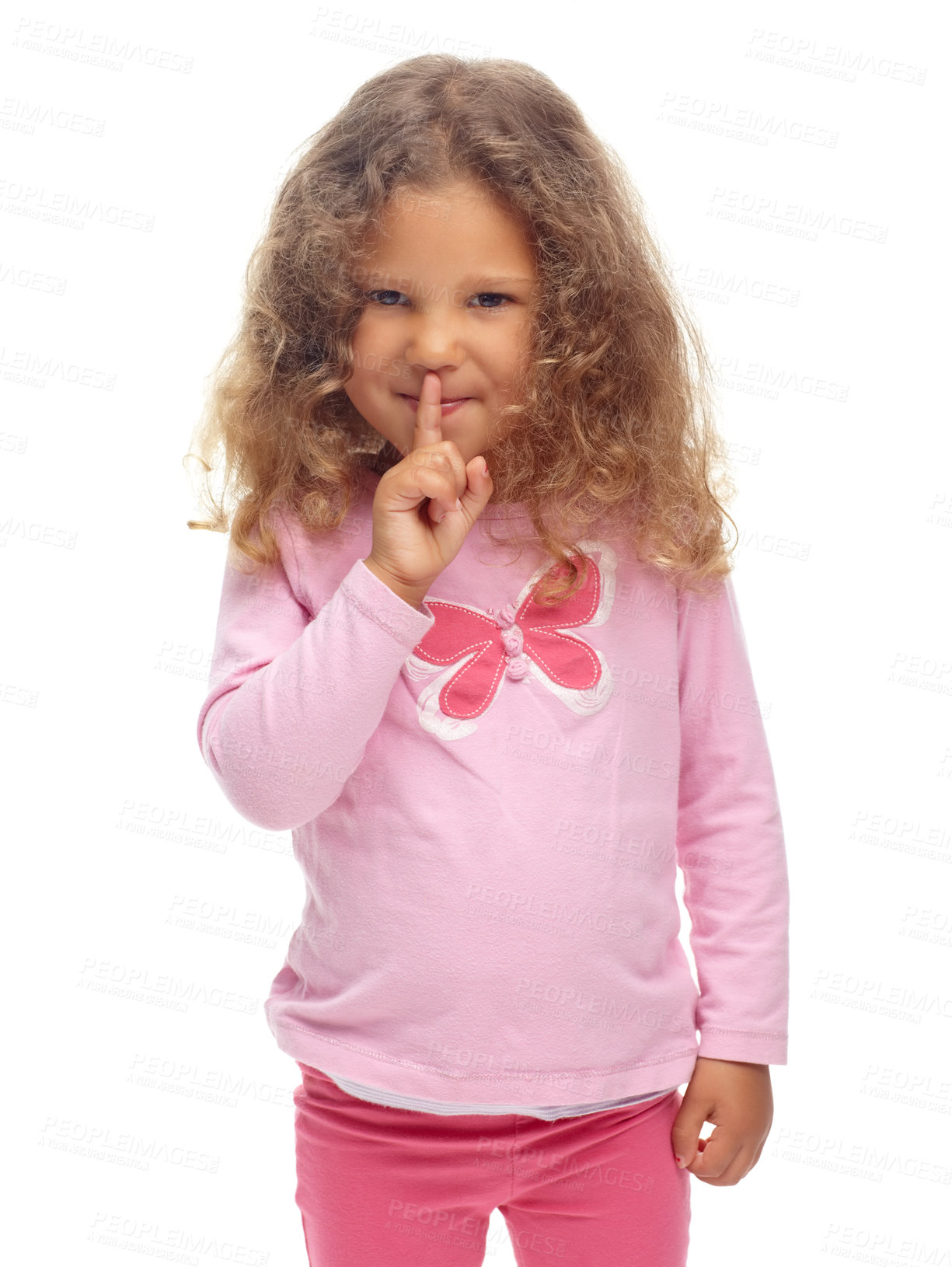 Buy stock photo Cute little girl making a "ssh" gesture against a white background