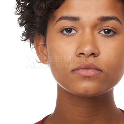 Buy stock photo Young woman, face focus and serious in a studio of a female teenager with white background. Beautiful, Indian teen person and youth portrait feeling focused and concentrating with a girl alone