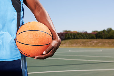 Buy stock photo Basketball player, hand and court with ball outdoor in summer for sport, game and competition. Athlete, ready or start training, exercise or man closeup on playground for practice, workout or fitness