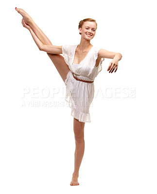 Buy stock photo Full length shot of a gorgeous young woman in an elegant ballet pose on a white background
