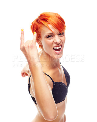 Buy stock photo A fiery redhead throwing devil horns at you while isolated on a white background
