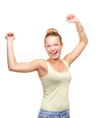 Buy stock photo A pretty smiling teenage girl standing with arms raised in the air in a joyful gesture