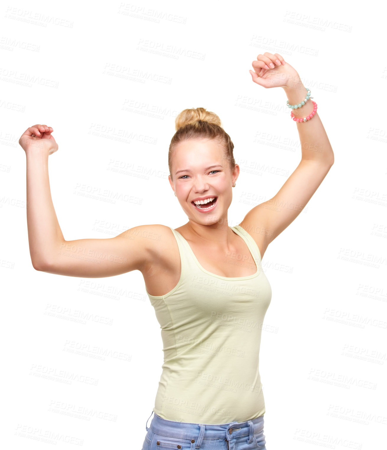 Buy stock photo A pretty smiling teenage girl standing with arms raised in the air in a joyful gesture