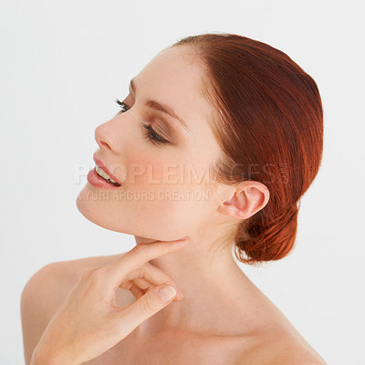 Buy stock photo Natural beauty, woman and touch face in white background, studio and isolated for skincare, dermatology or self love. Female model, aesthetic glow and makeup cosmetics for facial, aesthetics or shine
