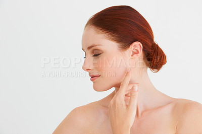 Buy stock photo Beauty, eyes closed and woman touch face in white background, isolated studio mockup and natural skincare. Female model, facial glow and makeup cosmetics for aesthetic dermatology, self love or shine