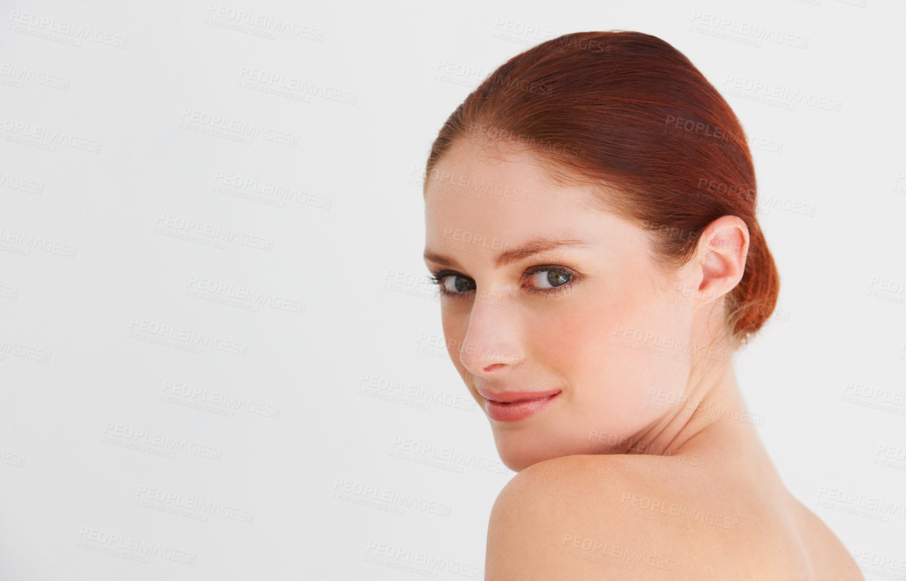 Buy stock photo A  woman looking over her shoulder seductively