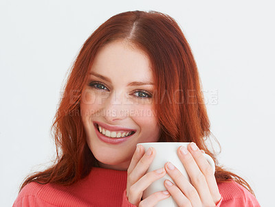 Buy stock photo Smile, coffee and portrait of woman in a studio with positive, good or confident attitude. Happy, mug and young female model from Canada drinking cappuccino, latte or tea isolated by white background
