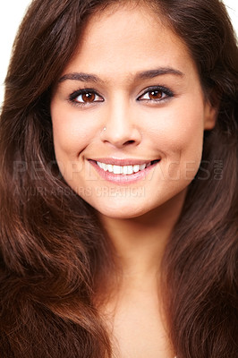 Buy stock photo Studio portrait of a beautiful smiling brunette