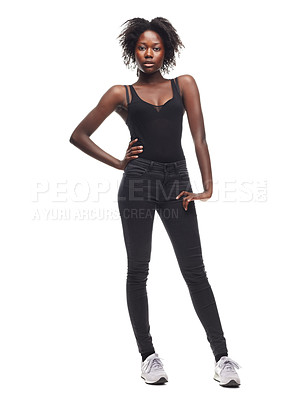 Buy stock photo Fashion, portrait and African girl model in a studio with a casual outfit, confidence and natural pose. Beauty, young and proud black woman with an afro posing while isolated by a white background.