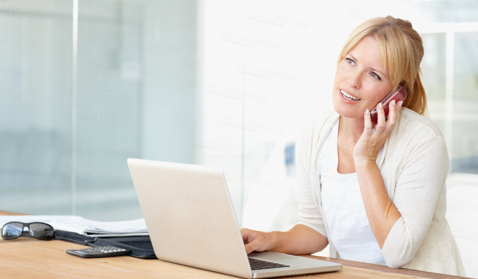 Buy stock photo Social networking, businesswoman and phone call with smartphone and laptop at her desk in work office. Technology or communication, entrepreneur and thinking female person planning business on tech