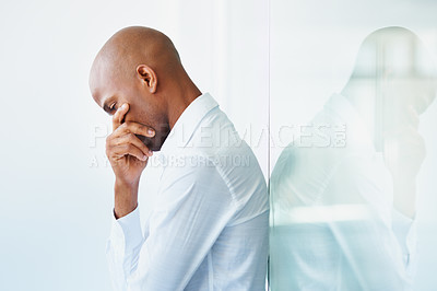 Buy stock photo Business stress, depression and black man in office, disappointed or unhappy on mockup. Sad, depressed and male professional with fatigue, tired or burnout, anxiety and mental health in workplace.