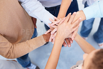 Buy stock photo Teamwork, group and hands stacked for collaboration, unity or motivation of business, community or team. People, support or solidarity or top view of joining together or goals, trust and commitment 