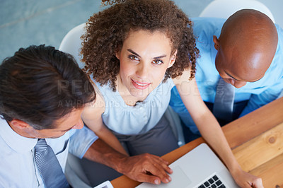 Buy stock photo Business woman, laptop and discussion with team, collaboration and working on project, proposal and strategy. People, planning and vision or agenda, teamwork and technology or smile and communication