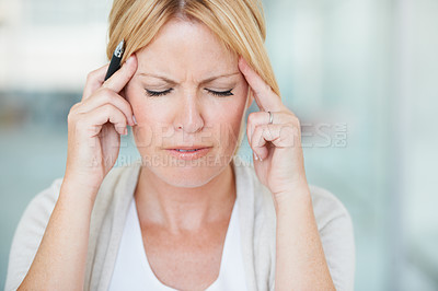 Buy stock photo Stress, headache and business woman with pain, sick and exhausted in office workplace. Burnout, migraine and female person with depression, fatigue or tired, vertigo and brain fog, problem or anxiety