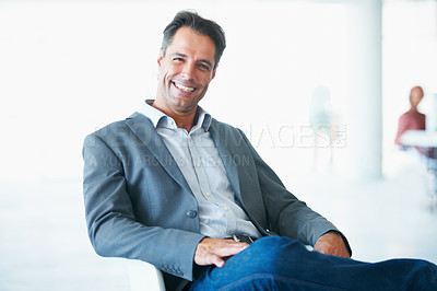 Buy stock photo Portrait, happy and business man on chair in office with pride for career or job. Professional, male entrepreneur and smile of executive, mature ceo or person from Canada sitting in company workplace