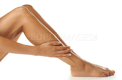Buy stock photo Skin, legs and woman in studio for beauty, wellness and grooming against a white background. Skincare, leg and model feeling perfect, smooth and glowing, satisfaction and luxury routine for body care