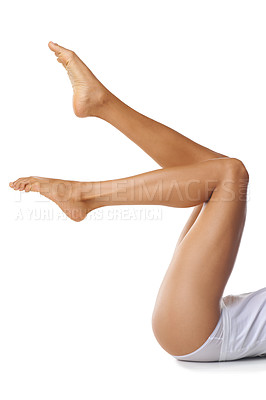 Buy stock photo Legs, beauty and skincare with a model black woman in studio isolated on a white background with mockup. Spa, feet and skin with a female posing in underwear for natural treatment or hair removal 