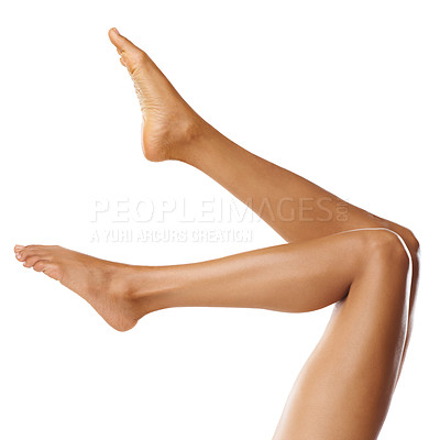 Buy stock photo Skincare, spa and legs of woman on a white background for shaving, grooming and pedicure wellness. Cleaning, beauty and feet of girl isolated in studio for laser treatment, cosmetics and hair removal