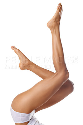 Buy stock photo Skincare, wellness and legs of woman on a white background for shaving, grooming and waxing. Cleaning, beauty and pedicure of girl isolated in studio for laser treatment, cosmetics and hair removal