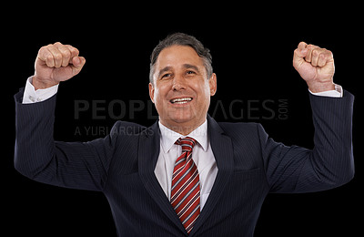 Buy stock photo Business man, winner and power or yes for success, celebration and winning, achievement or goals in studio. Professional boss or mature person in suit with fist for motivation on a black background