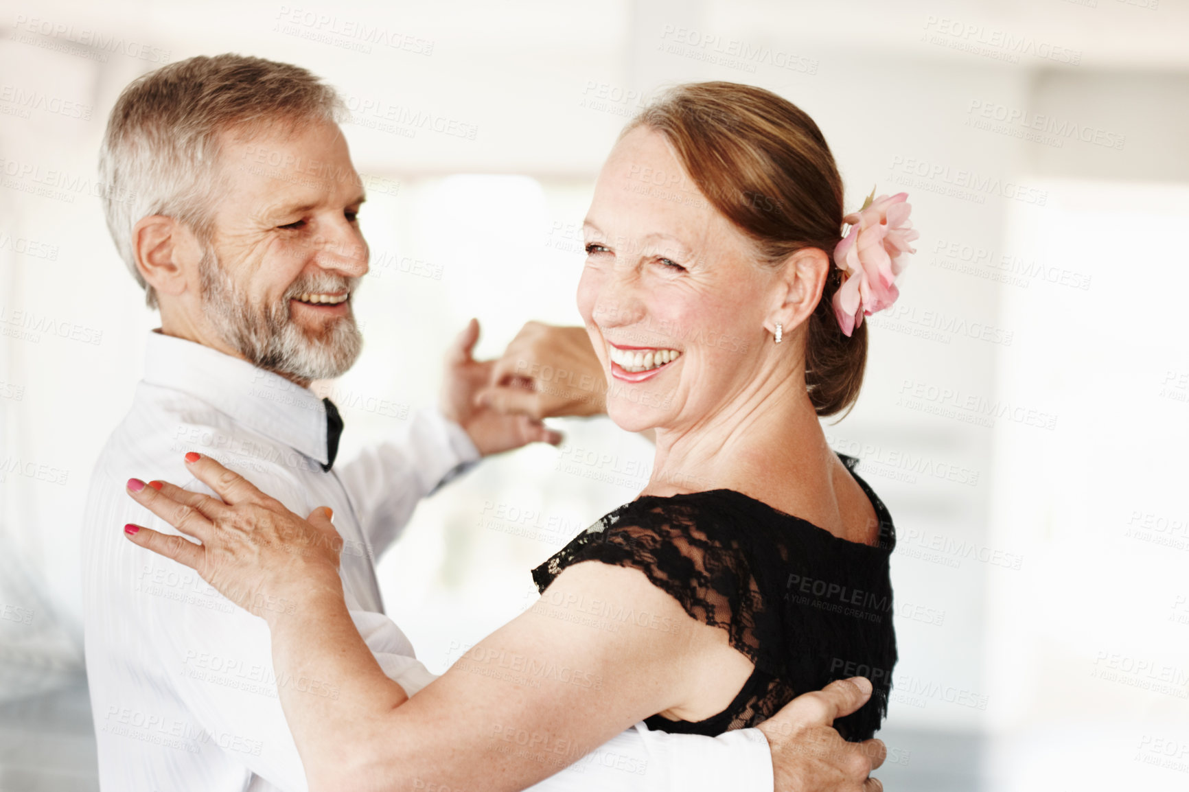 Buy stock photo Shot of a mature couple dancing together in formal attire