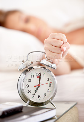 Buy stock photo Snooze, alarm and hand of woman in morning wake up with tired, exhausted and no sleep at home. Depression, sleeping and annoyed female person with anxiety, frustrated and stress hit bedroom clock