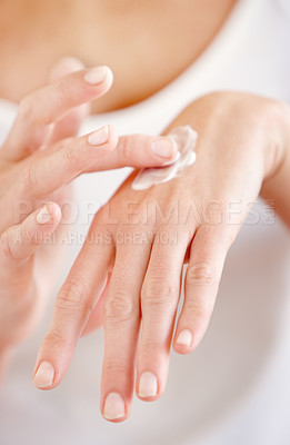 Buy stock photo Hand cream, moisturizer and woman hands closeup with beauty and skin glow from treatment. Wellness, sunscreen and skincare lotion of a female person with manicure and cosmetics application with care
