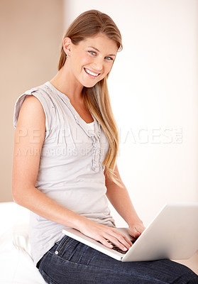 Buy stock photo Relax, laptop and smile with portrait of woman on sofa for social media, streaming and website. Search, technology and digital with female user typing at home for connection, email and internet