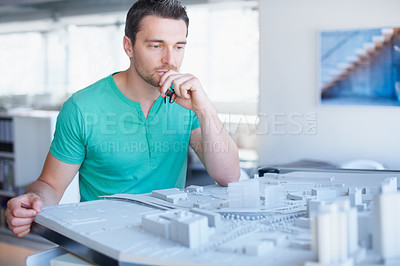 Buy stock photo Architecture, model and business man thinking, planning and building development or infrastructure solution. Engineering, ideas and problem solving of designer, contractor or person with 3d project