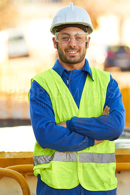 Buy stock photo Portrait of a construction worker wearing protective glasses and smiling at you