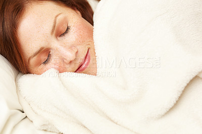 Buy stock photo A beautiful young woman sleeping happily in her bed